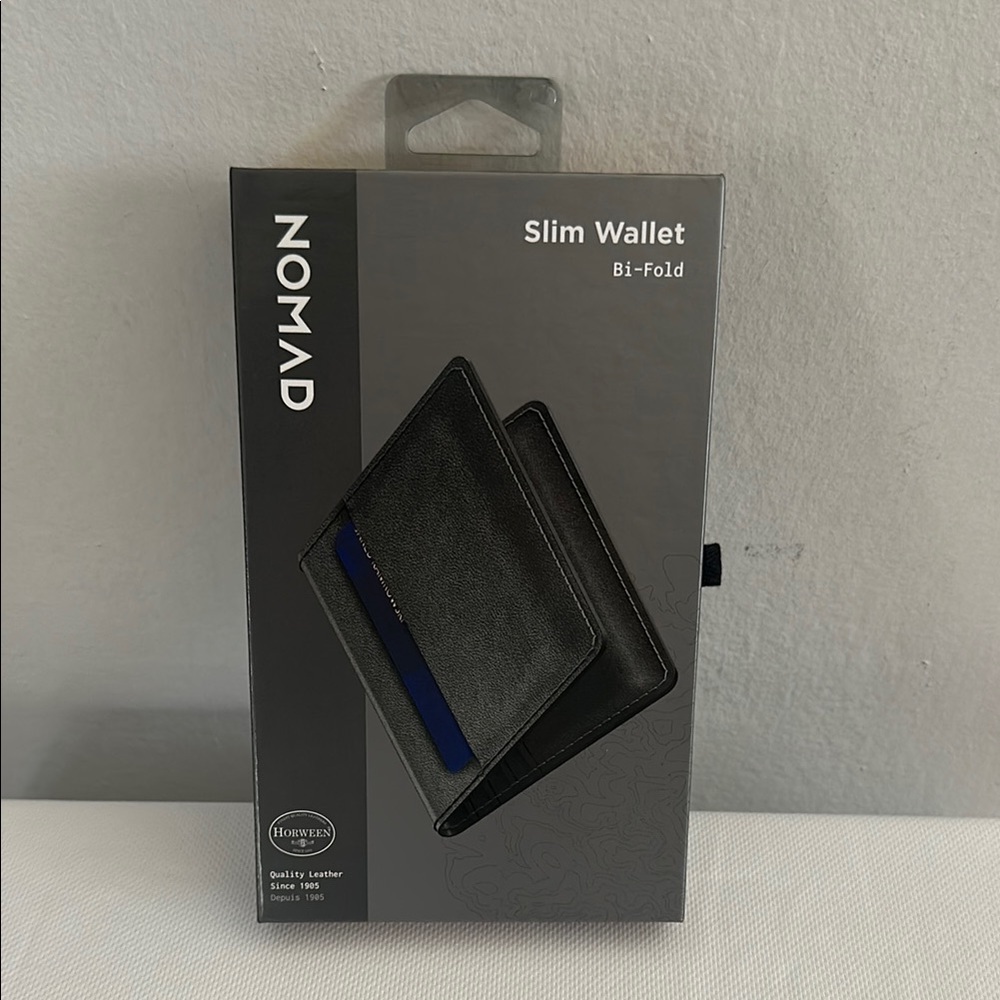 Nomad Black Leather Bi-Fold Wallet with Blue Accent